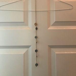 Long gold necklace